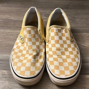 Yellow checkered Vans slip on